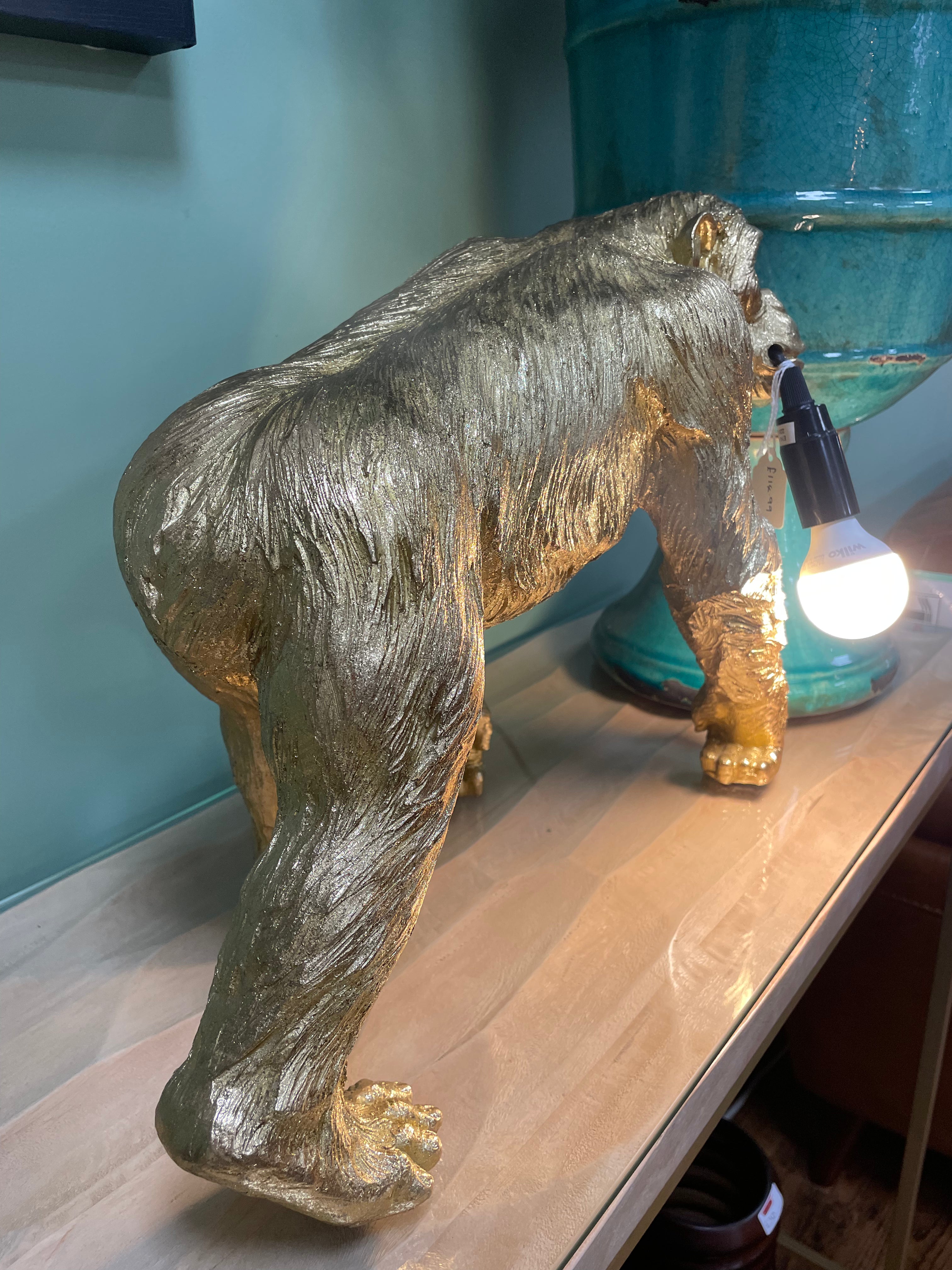 Walking Monkey Holding a Bulb