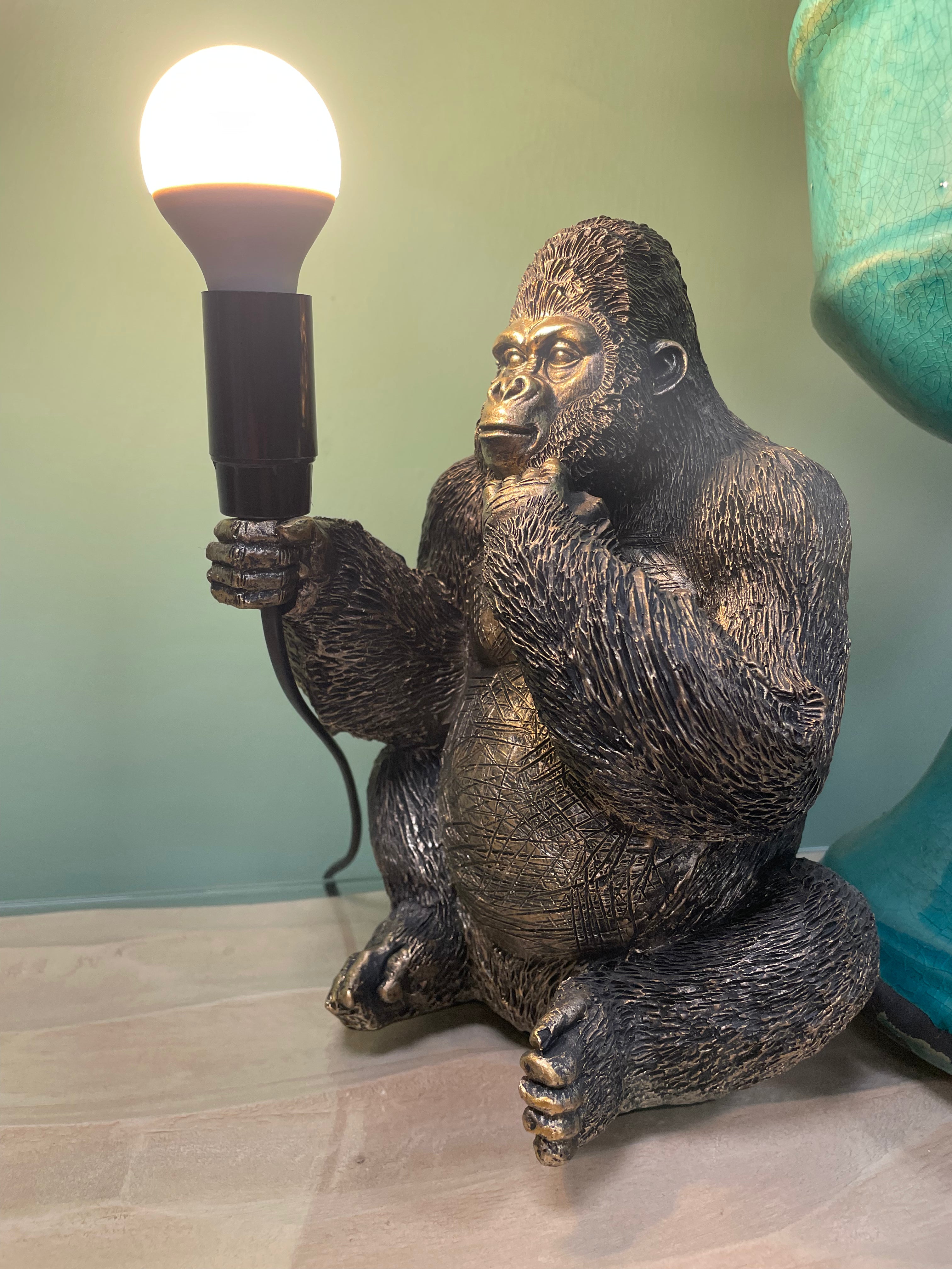 Gorilla Holding a Bulb