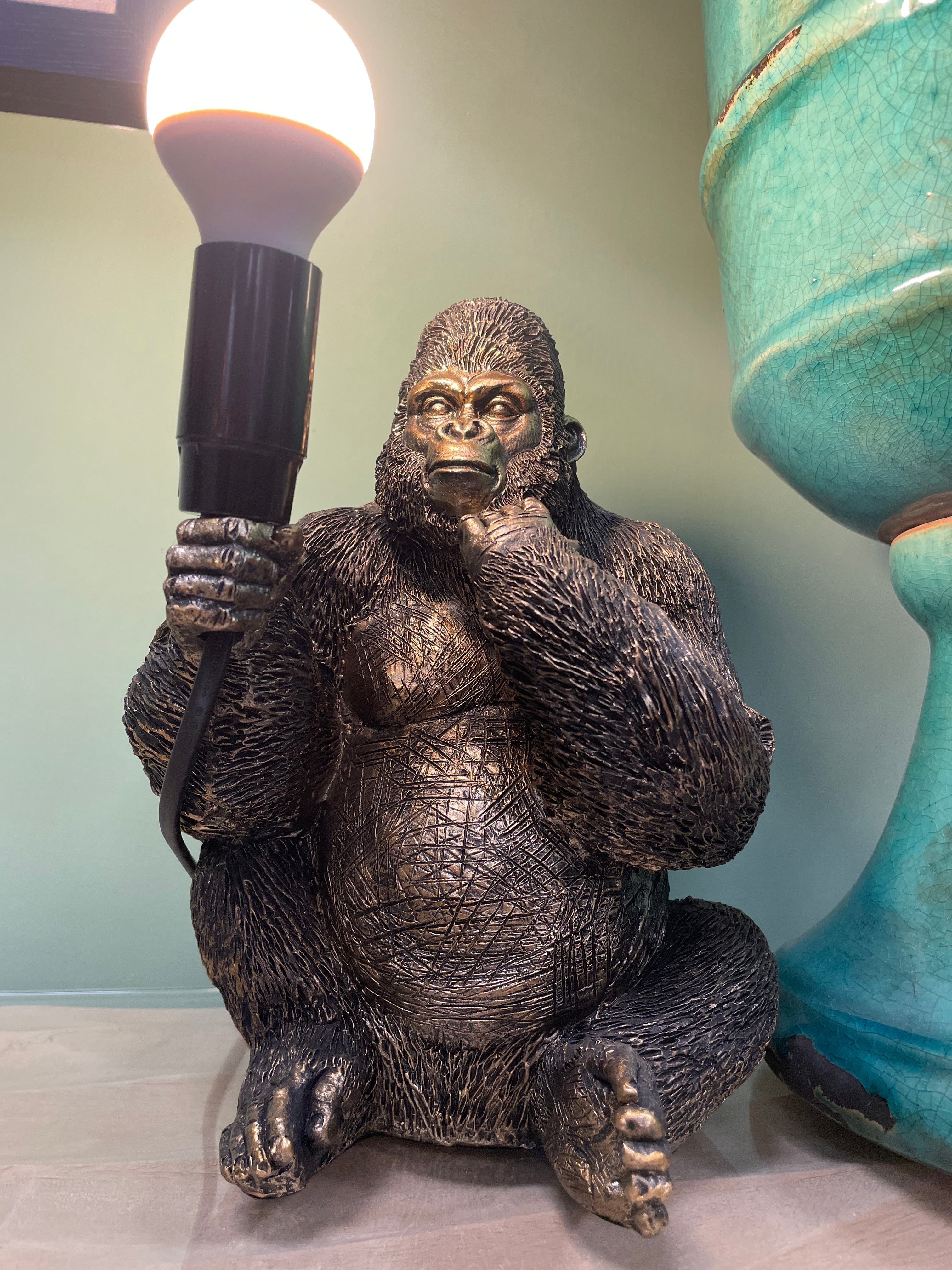 Gorilla Holding a Bulb