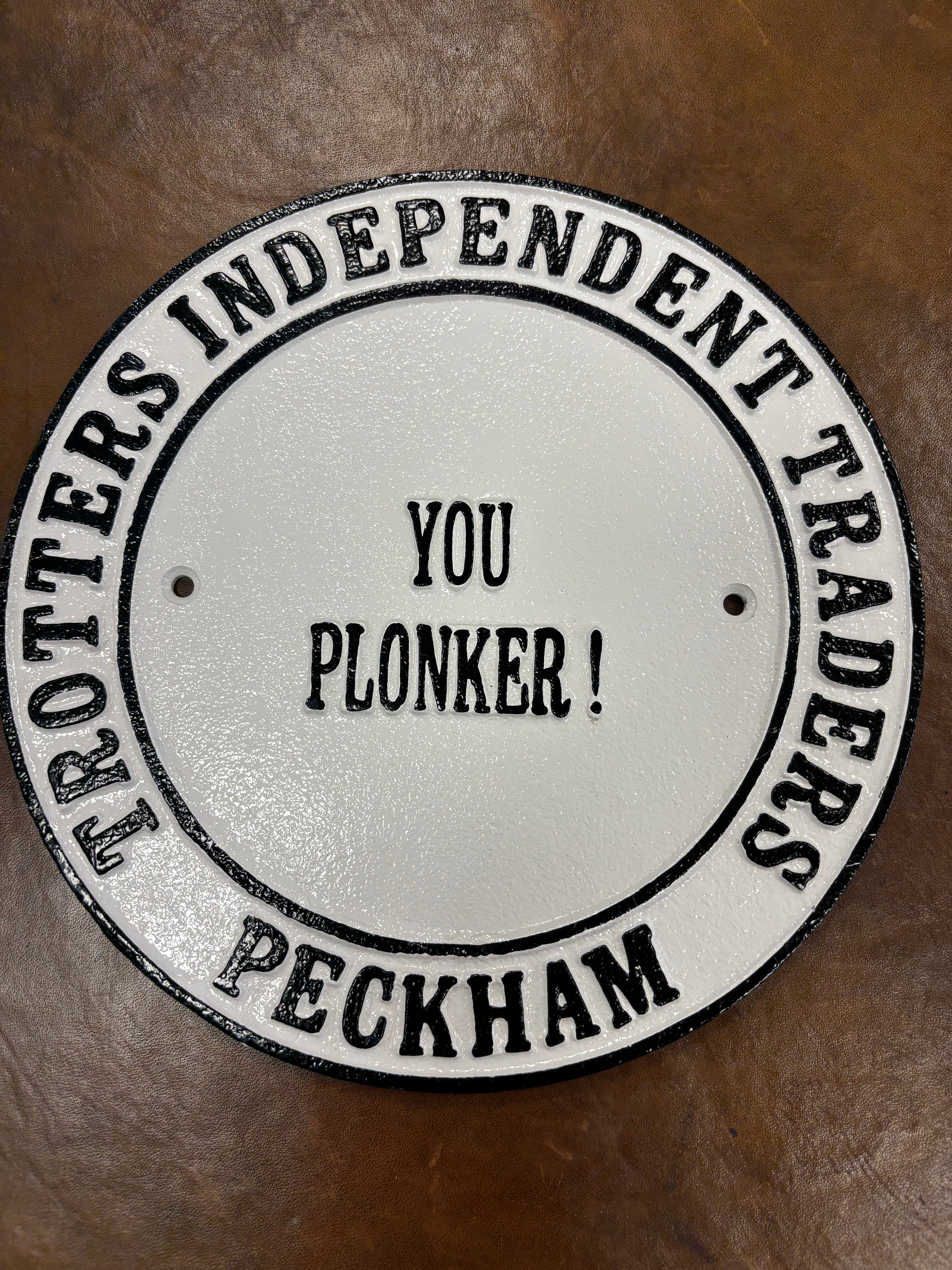 Trotters Independent Traders YOU PLONKER! sign