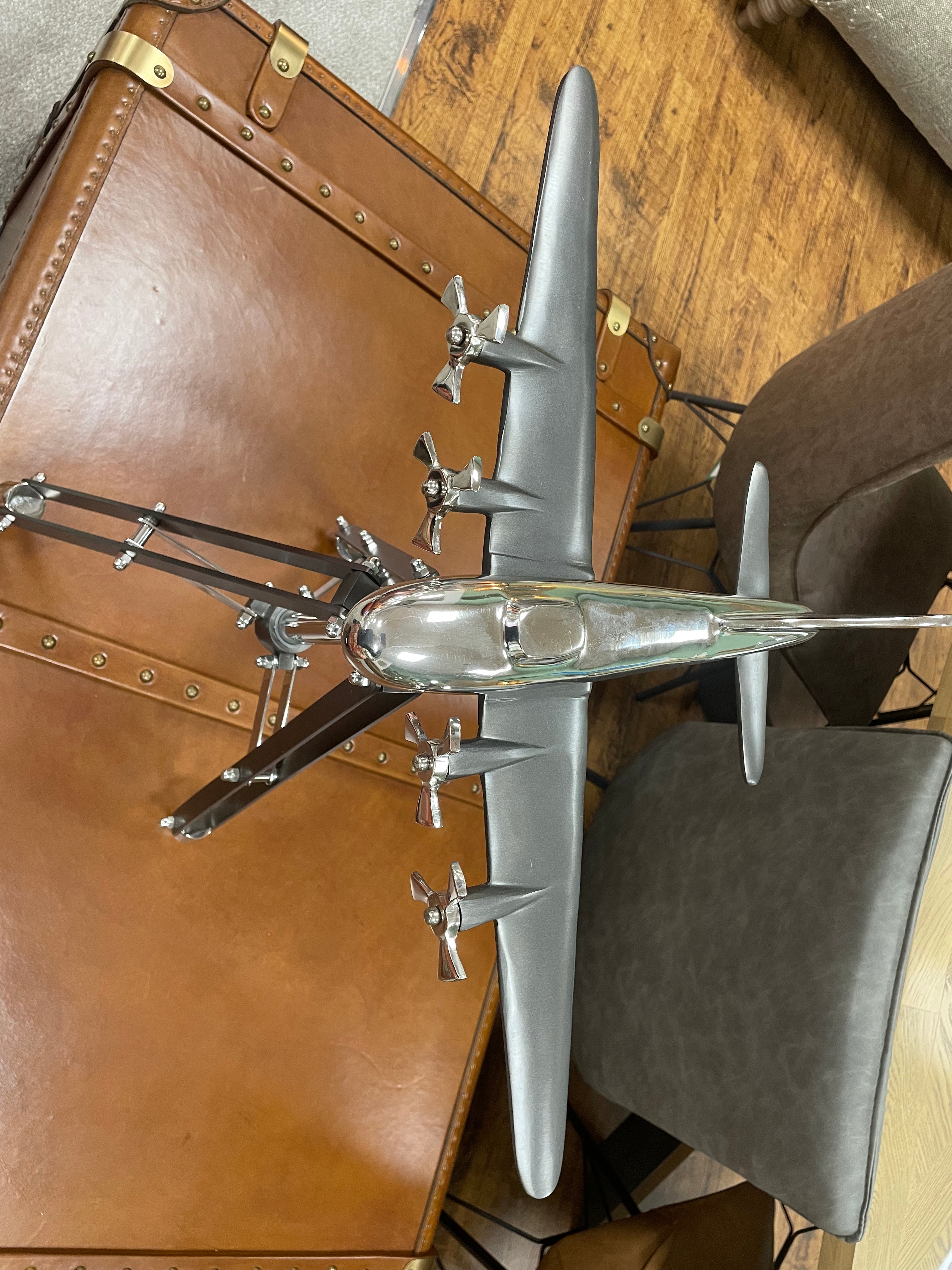 Stainless Steel Fighter Plane On Tripod Stand